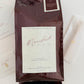 Coffee bag labeled 'Manifest Blend' on a light background