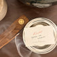 Incense stick and container with a manifest label on a wooden surface, written on the label- systems over willpower